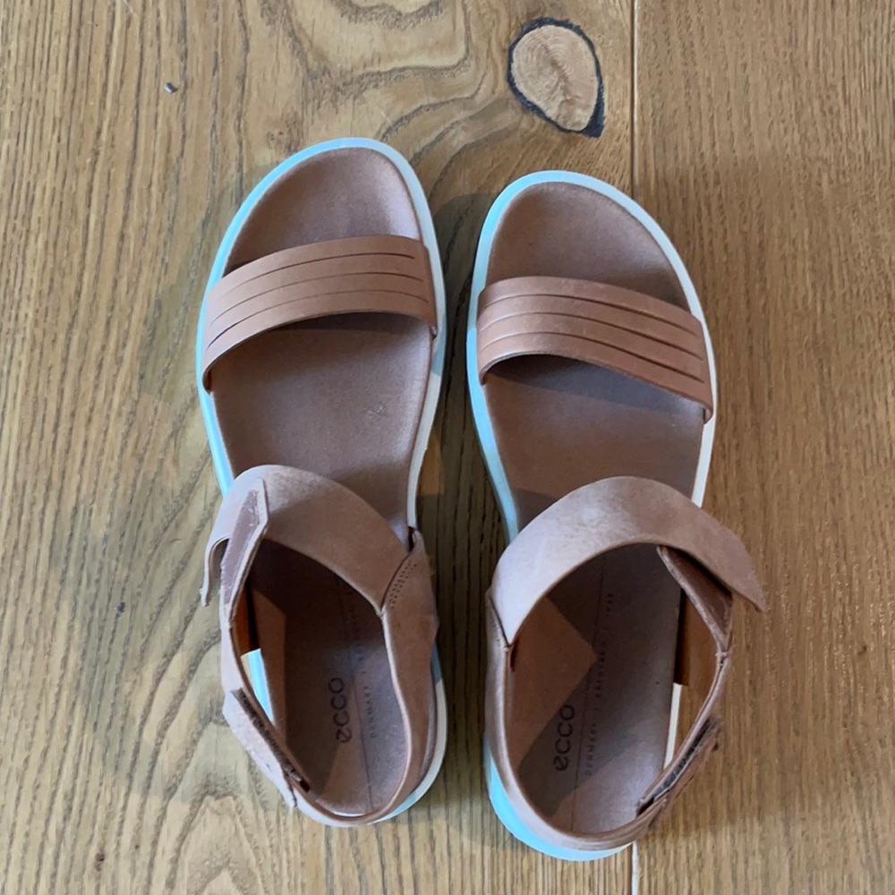 Ecco sandals. Tan with a white bottom.